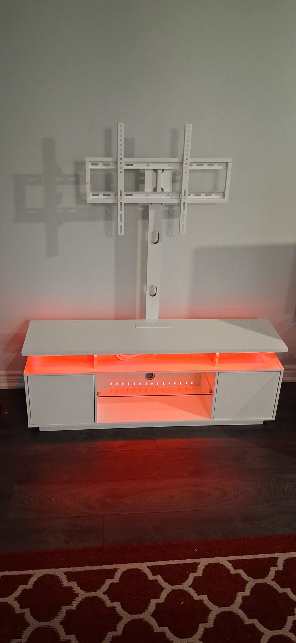 TV stand assembly with LED lighting in Ottawa — FixItAll Handyman Services