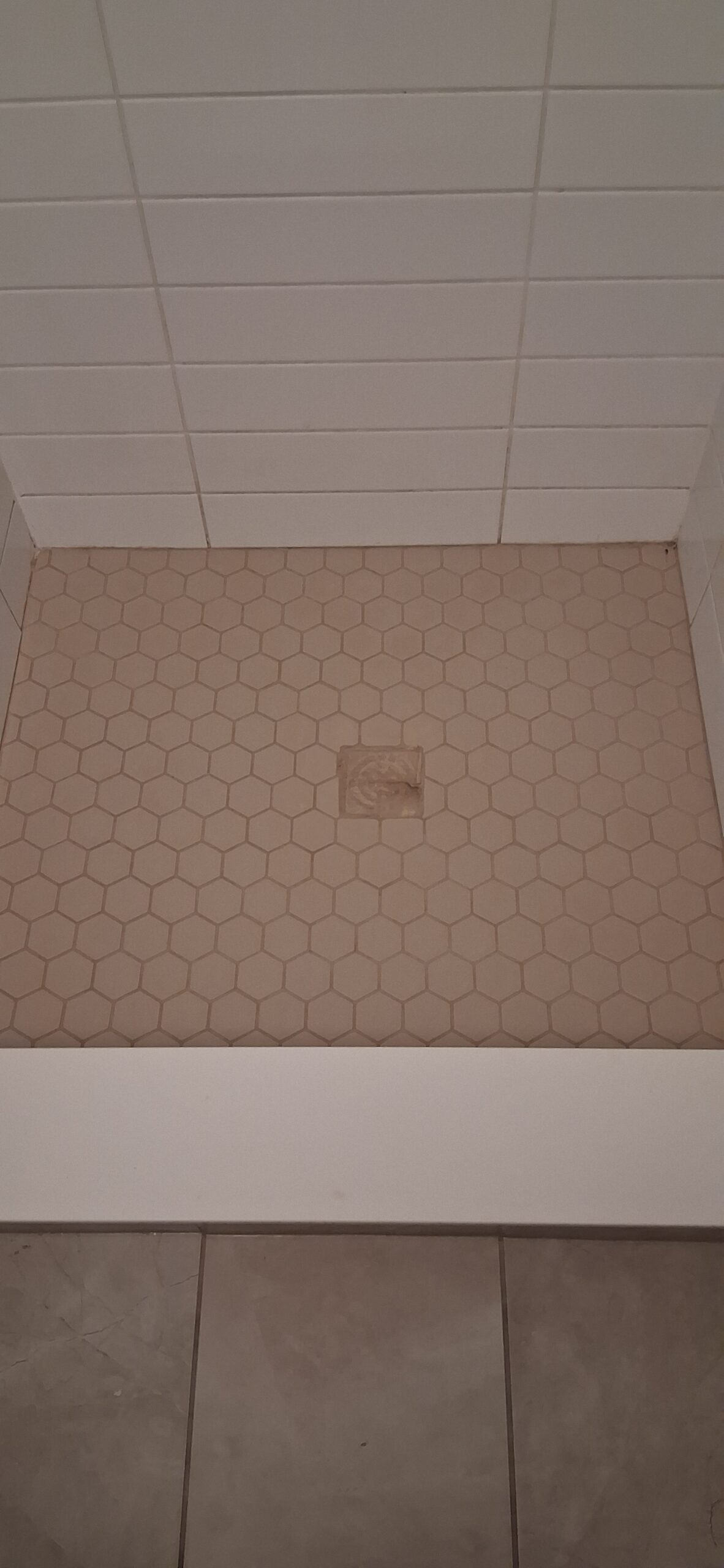 Shower tile grout renewal in Ottawa — FixItAll Handyman Services