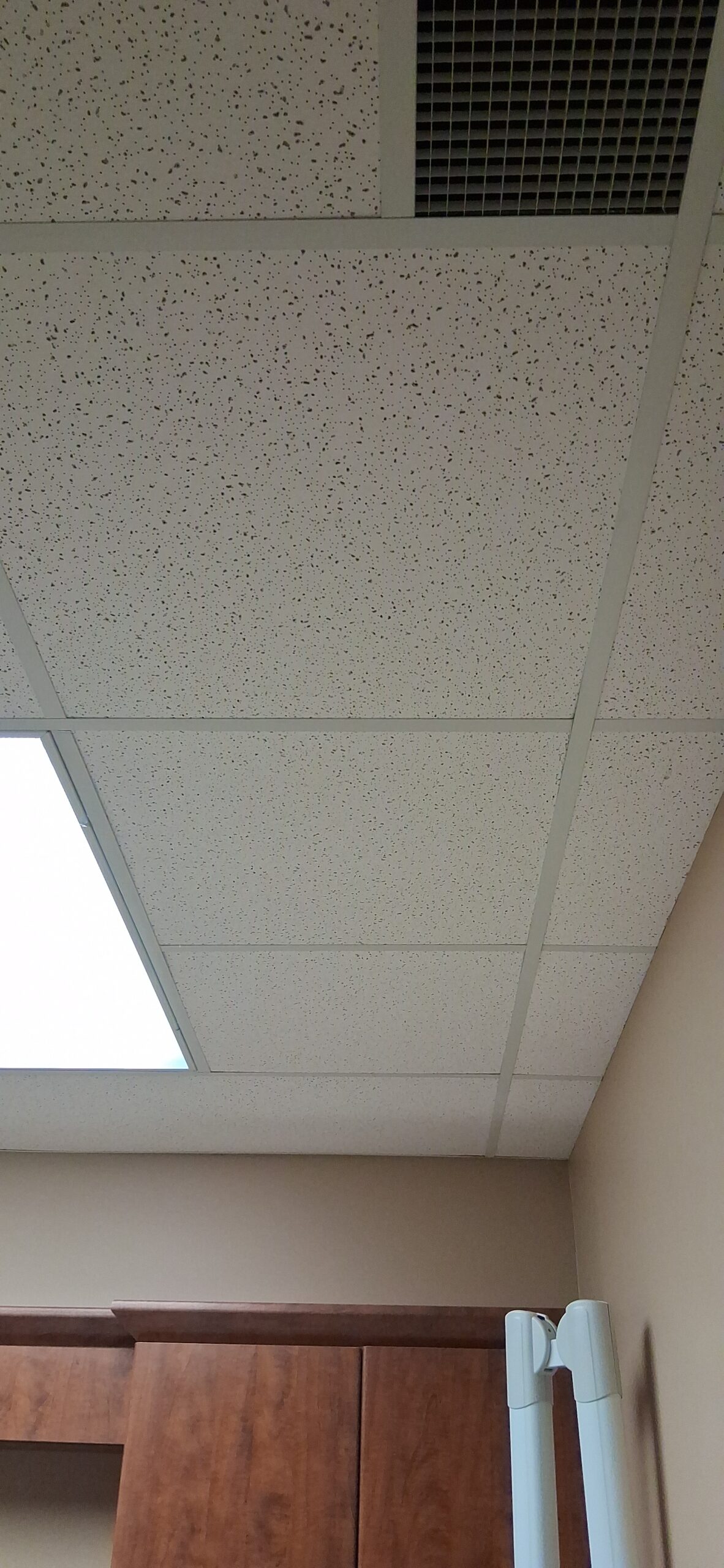 Armstrong ceiling tile replacement in Ottawa office — FixItAll Handyman Services