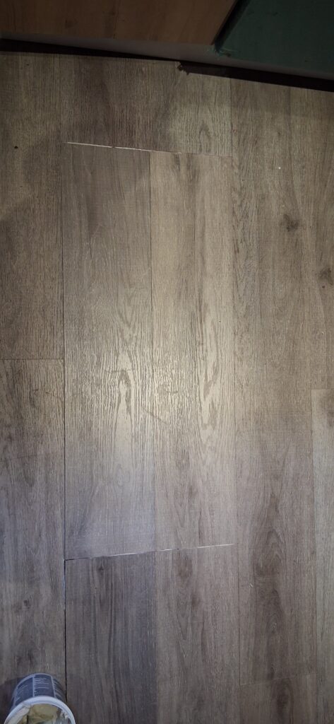 Laminate floor repair and replacement of damaged plank in Ottawa — FixItAll Handyman Services