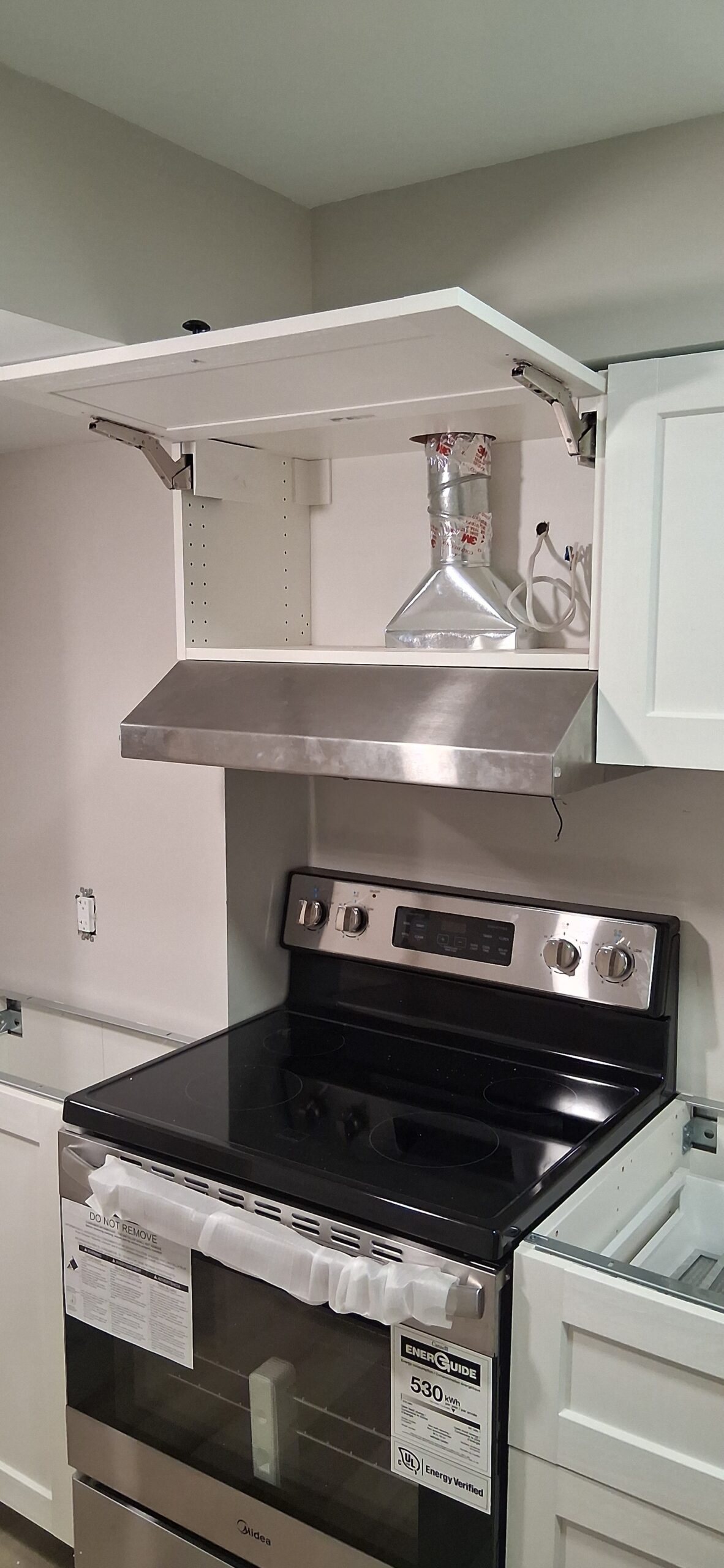 Kitchen range hood installation in Ottawa — FixItAll Handyman Services