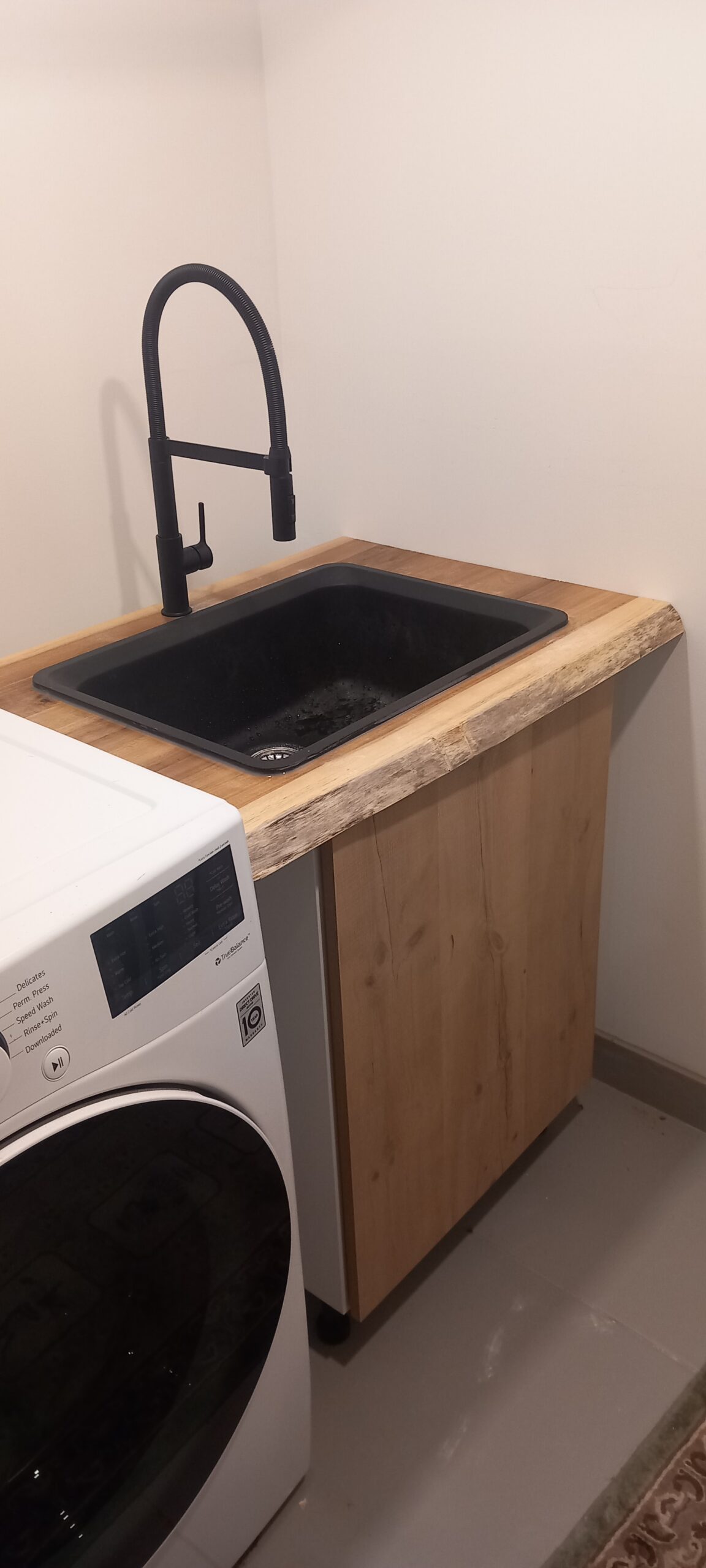 Utility countertop with sink and faucet installed in Ottawa — FixItAll Handyman Services