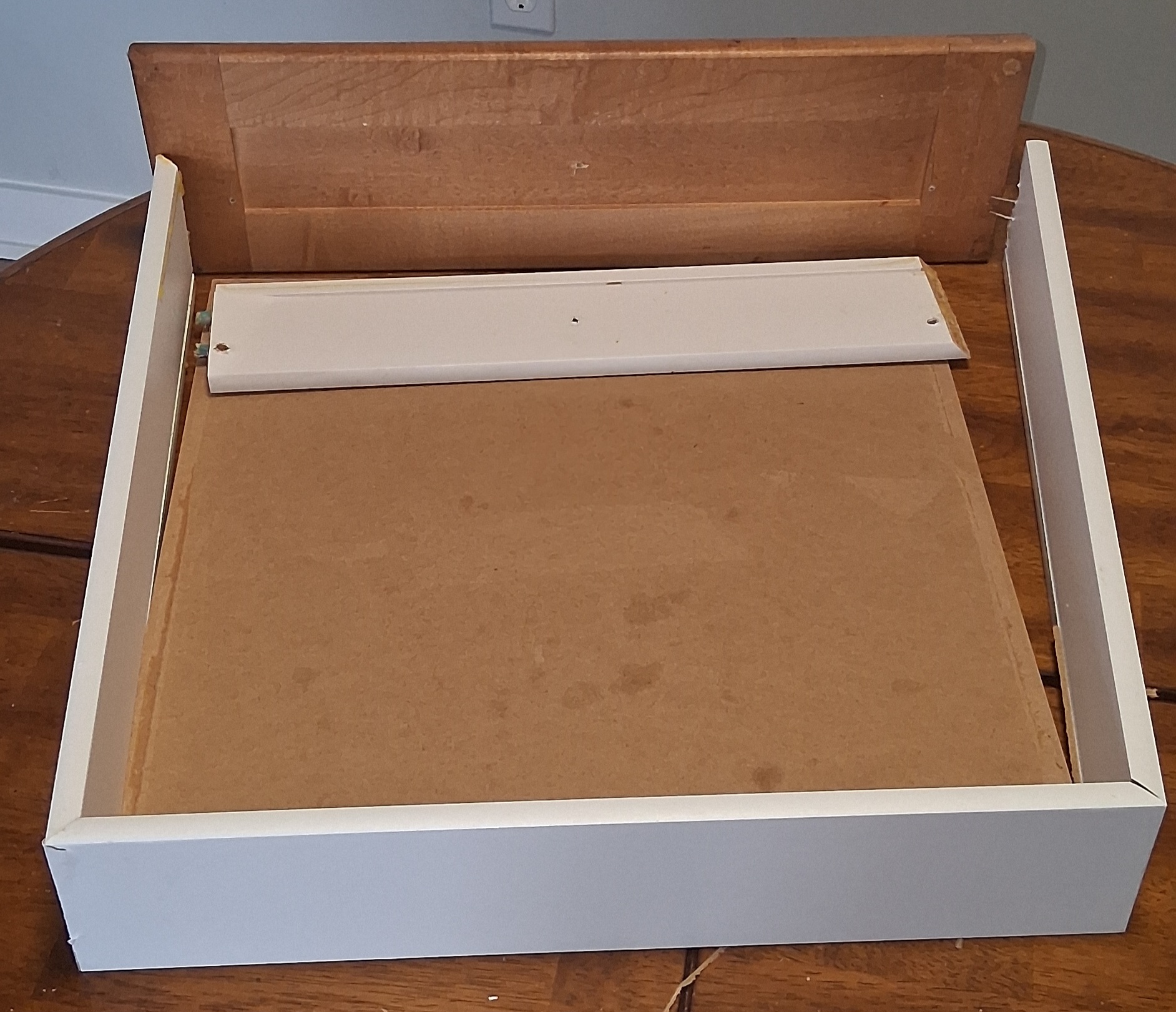 Before: kitchen drawer misaligned and not closing smoothly in Ottawa