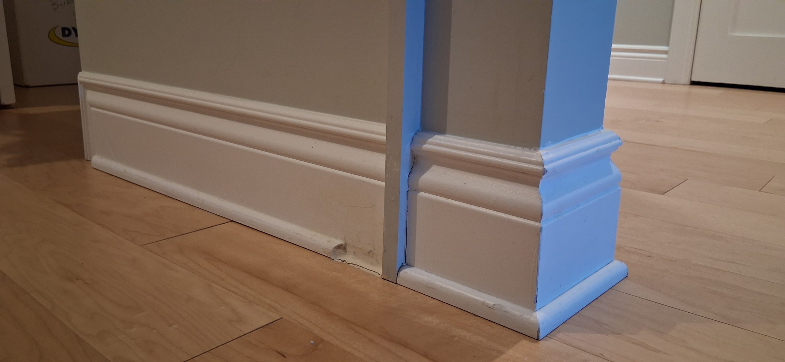 Freshly painted trim and baseboards with clean sharp lines in Ottawa home