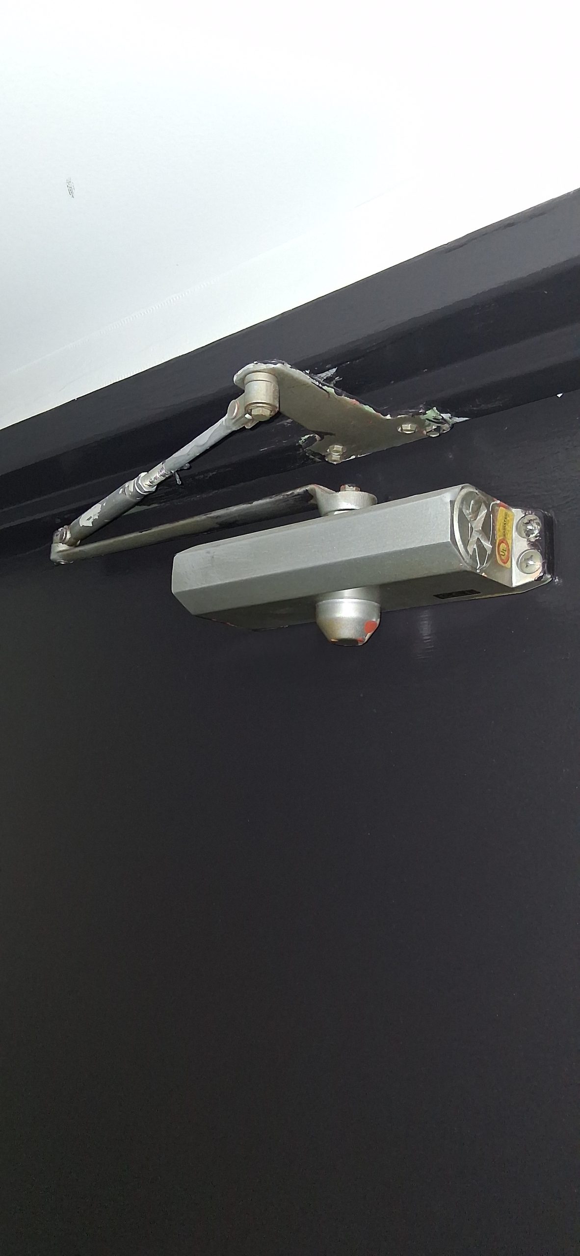 Door closer repair and installation in Ottawa — FixItAll Handyman Services
